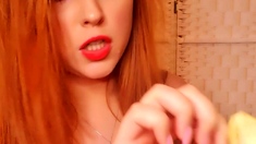 Sexy redhead teen strips and masturbates