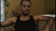 Horny blonde dude and hot black stud please each other's dicks on the couch