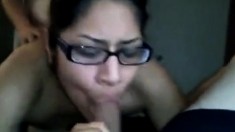 Chubby Asian in glasses enjoys two cocks