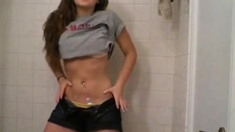 Girl undressing in the bathroom (not nude)